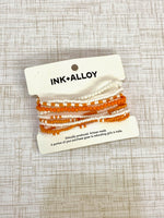 Sage 10 Strand Bracelet Orange Ink + Alloy