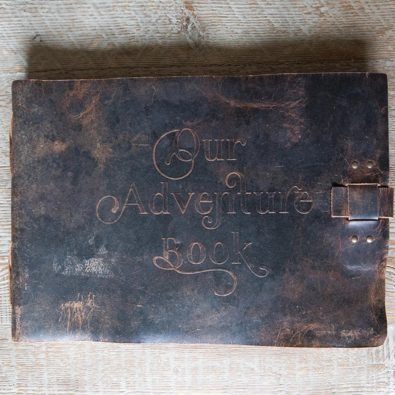 Brown Leather Embossed Guest Book