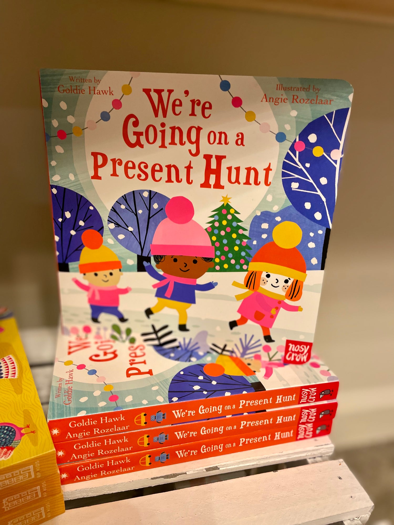 We're Going on a Present Hunt Board Book