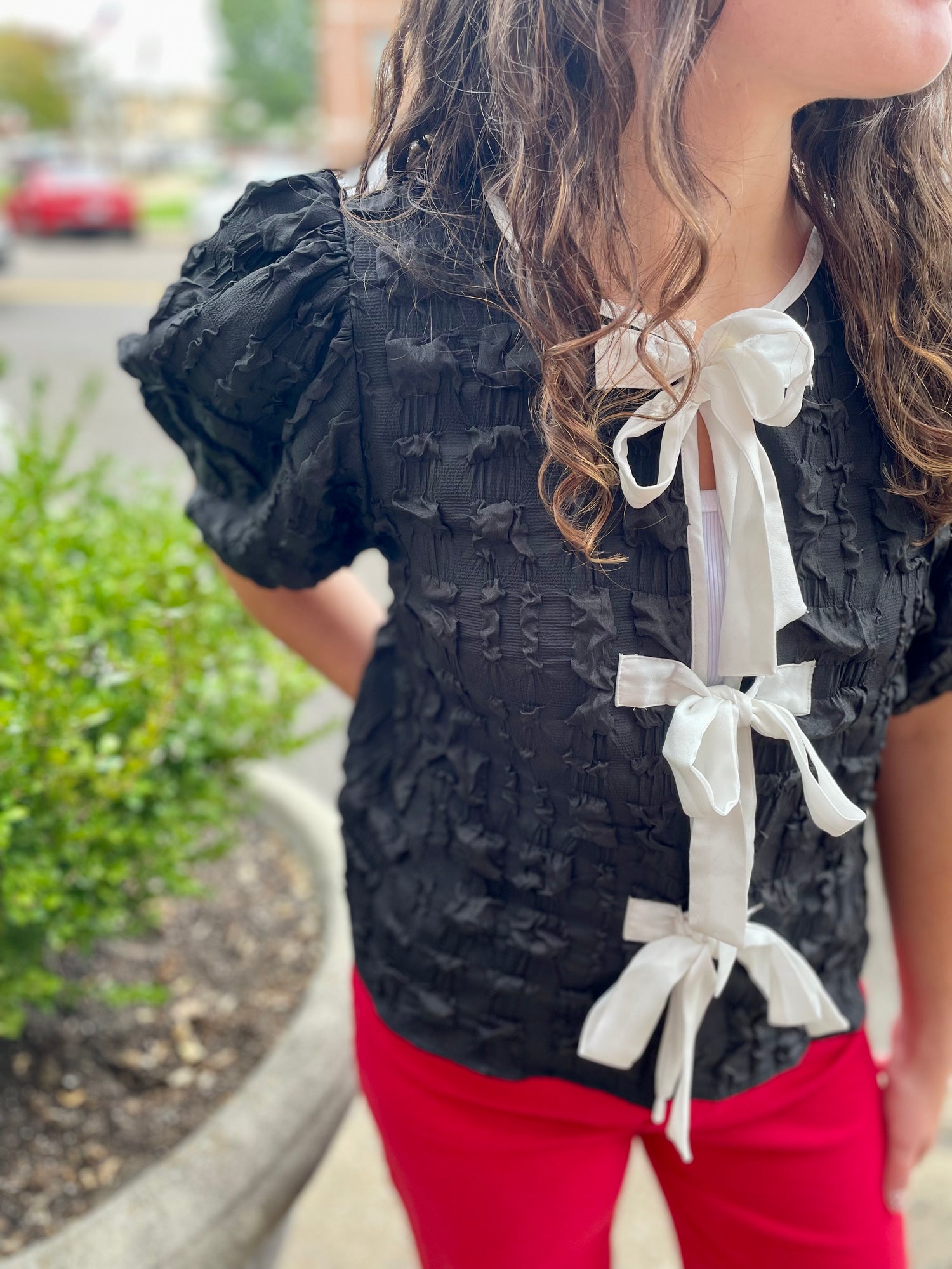 Bowed to Perfection Top